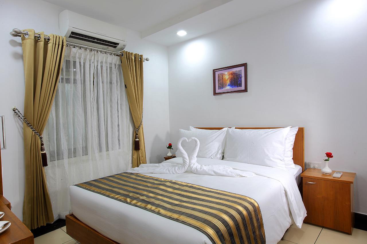 Pgs Inn Kochi Exteriör bild